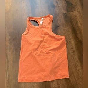 Lulu tank top, peachy color, super soft and stretchy, lightly worn